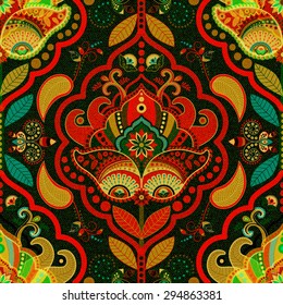 Seamless floral pattern, ethnic style. Vector indonesian batik. Vector stylized flowers and paisley. Pattern with stylized flowers and paisley. Design for fabric, web, textile, wrapping paper, cover.