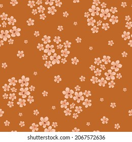 Seamless floral pattern. Fashionable background of beige flowers. flowers scattered on a terracotta background. Stock vector for printing on surfaces and web design.