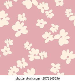 Seamless floral pattern. Fashionable background of milk flowers . flowers scattered on a pink background. Stock vector for printing on surfaces and web design.