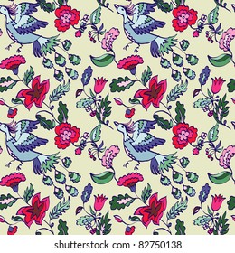 Seamless floral pattern with firebird on a light background