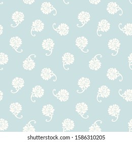 Seamless floral pattern. The flowers are arranged in a chaotic order, beautiful blue background.