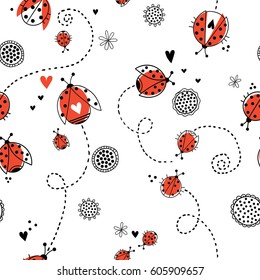 Seamless floral pattern with flying ladybirds
