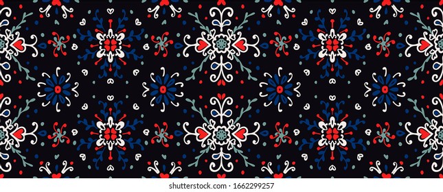 Flores y hojas de color folclórico sin fisuras. bordado de flores.Patrón de Talavera. Papeleo indio. El adorno turco. Origen étnico español. Papel tapiz mediterráneo impecable.