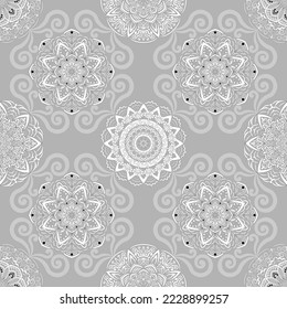 Patrón floral sin soldadura, dibujado a mano, vector. Mandalas blancas y grises, estilo boho, fondo gris.