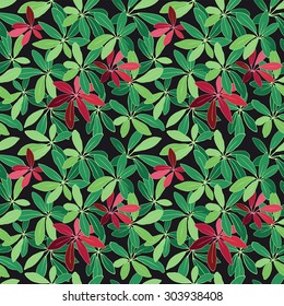 Seamless floral pattern isolated in vector. Exotic foliage on a black background