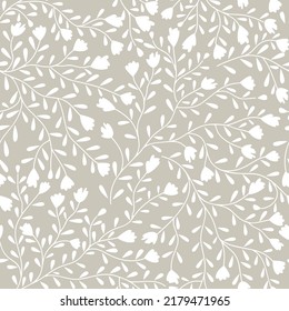 Patrón floral sin soldadura con hojas y ramas. Flores vectoriales y ramas en el fondo beige.