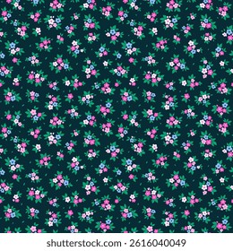 Seamless floral pattern, liberty ditsy print with rustic motif. Romantic botanical design for fabric, paper. Hand drawn flowers. Small pink and blue flowers, tiny leaves on  dark blue background. 