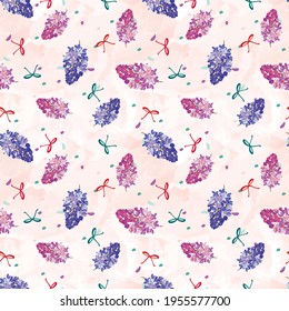 Seamless floral pattern with lilac flowers on watercolored background. For textile, paper, packaging, covers