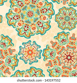 Seamless floral pattern. Looks like folk cloth. Bright flowers on beige background.