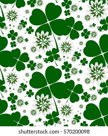 Seamless floral pattern with lucky shamrock leaves and flowers in green and white colors. Vector illustration