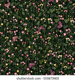 seamless floral pattern with meadow flowers and butterflies on dark background