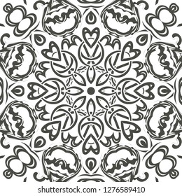 Seamless floral pattern motif coloring mandala drawn with a pen. black and white. Ethnic, fabric, motifs. Vector, abstract flower mandala. Decorative elements for design. EPS 10