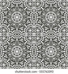 Seamless floral pattern motif coloring mandala drawn with a pen. black and white. Ethnic, fabric, motifs. Vector, abstract flower mandala. Decorative elements for design. EPS 10.