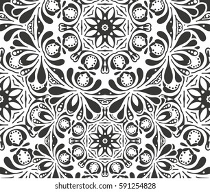 Seamless floral pattern motif coloring mandala drawn with a pen. black and white. Ethnic, fabric, motifs. Vector, abstract flower mandala. Decorative elements for design. EPS 10.