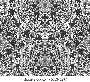 Seamless floral pattern motif coloring mandala drawn with a pen. black and white. Ethnic, fabric, motifs. Vector, abstract flower mandala. Decorative elements for design. EPS 10.