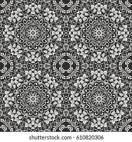 Seamless floral pattern motif coloring mandala drawn with a pen. black and white. Ethnic, fabric, motifs. Vector, abstract flower mandala. Decorative elements for design. EPS 10.