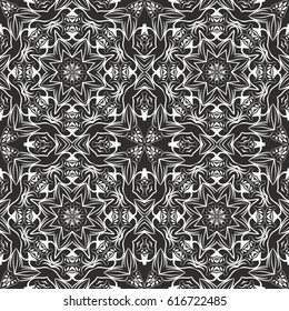Seamless floral pattern motif coloring mandala drawn with a pen. black and white. Ethnic, fabric, motifs. Vector, abstract flower mandala. Decorative elements for design. EPS 10.