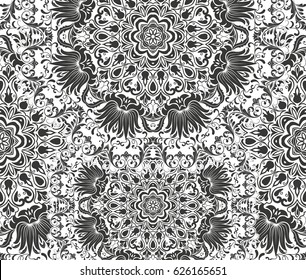 Seamless floral pattern motif coloring mandala drawn with a pen. black and white. Ethnic, fabric, motifs. Vector, abstract flower mandala. Decorative elements for design. EPS 10.