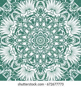 Seamless floral pattern motif coloring a mandala drawn with a pen. green, turquoise and white. fabric, motifs. Vector, abstract mandala flower. Decorative elements for design. EPS 10.