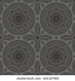 Seamless floral pattern motif mandala drawn with a pen. black and white. Ethnic, fabric, motifs. Vector, abstract flower mandala. Decorative elements for design. EPS 10.