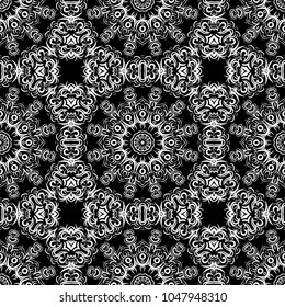 Seamless floral pattern motifs suitable for wallpaper and fabric design. Vector illustration. Monochrome