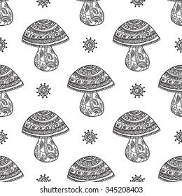 
Seamless floral pattern mushrooms grow. Mushrooms and whimsical flowers, black and white graphics, painted by hand. For the design and decoration background, wallpaper, packaging, fabrics, textiles.