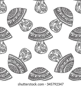 Seamless floral pattern mushrooms grow. Black and white graphics, painted by hand. For the design and decoration background, wallpaper, packaging, fabrics, textiles.