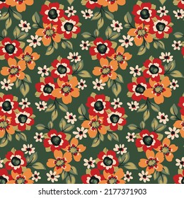 Seamless floral pattern in natural colors. Beautiful ditsy print, trendy botanical background with small hand drawn flowers, leaves on a green field. Vector illustration.