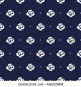 Seamless floral pattern. Navy blue seamless pattern with little white flowers (roses) and dots. Dark blue floral background.