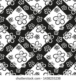 Seamless floral pattern. On the background of black and white squares are drawn contours of flowers. Vector illustration.