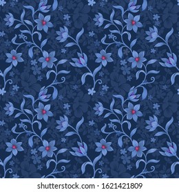 Seamless floral pattern on blue monochrome background fabric textile wallpaper.