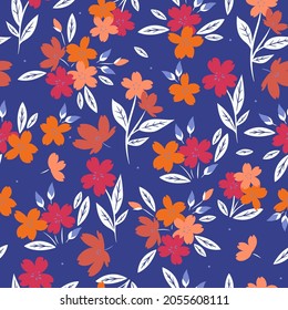 Seamless floral pattern on a blue background. Vector graphics.
