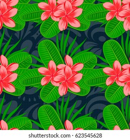 Seamless floral pattern on a blue background with motley plumeria flowers. Vector illustration.