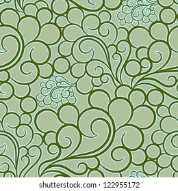 Seamless floral pattern on a green background