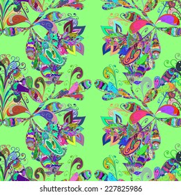 Seamless floral pattern on green background. Vector illustration.