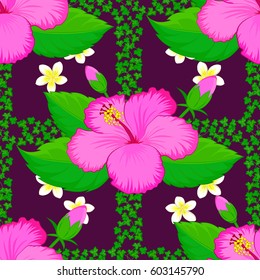 Seamless floral pattern on a purple background with motley hibiscus flowers. Vector illustration.