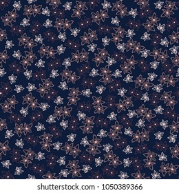 Seamless floral pattern over dark background.  Small cute simple elegant flowers