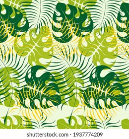 seamless floral pattern with palm leaves and monstera on a light background
