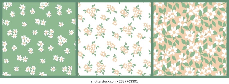 Seamless floral pattern, pretty liberty ditsy print set. Cute, romantic botanical design in pastel colors: small hand drawn chamomile flowers, tiny leaves on a light background. Vector illustration.