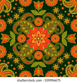 Seamless floral pattern of red and orange flowers on a dark green background. The pattern on the basis of traditional oriental elements paisley, Indian cucumber, buta. Vector illustration.
