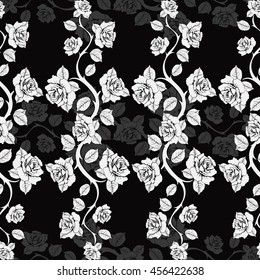 Seamless floral pattern with roses branches. White roses on a black background. Monochrome, vector black and white floral background. For wallpaper, wrap, fabric design