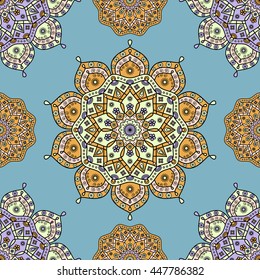 Seamless floral pattern in shades of orange, pale yellow & pale lavender on turquoise green background. Vintage vector ornamental print in Oriental style elements of Indian/Arabic/Ottoman inspiration.