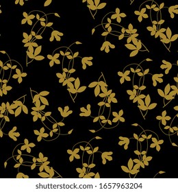 Seamless floral pattern with silhouetted branches of clematis flower. Gold silhouettes on black background.