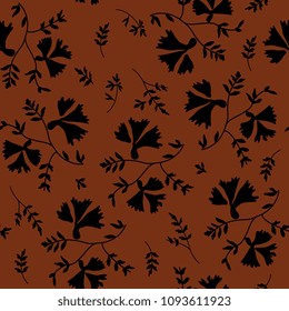 Seamless floral pattern with silhouetted motifs. Black ornament on maroon red background.