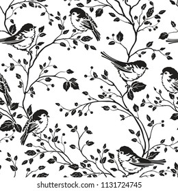 Seamless floral pattern with silhouettes birds and branches with leaves. Vector black and white illustration. Template for swatch.