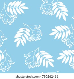 Seamless floral pattern with silhouettes of rowan tree clusters.