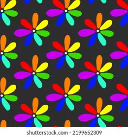 Seamless floral pattern. Simple camomile vector illustration. Graphic fabric print template. Doodle rainbow coloured flowers. Scrapbook or wrapping paper.