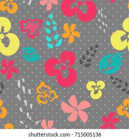 Seamless floral pattern with simple flowers, leaves and branches on dotted background