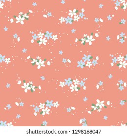 Seamless floral pattern with small cute flowers on a pink background. Spring light airy texture for Wallpaper, interior, tiles, textiles, scrapbooking, packaging and various types of design. vector.