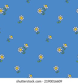Seamless floral pattern with small daisies on a blue background. Cute ditsy print, simple botanical surface design with tiny hand drawn plants, pretty cartoon flowers. Vector illustration.